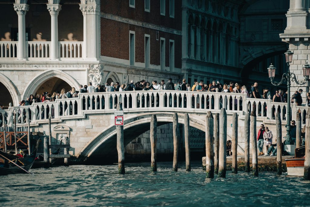 busy tourist bridge in venice italy