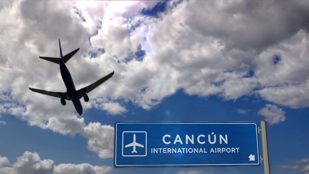 Airplane silhouette taking off in Cancún, Mexico