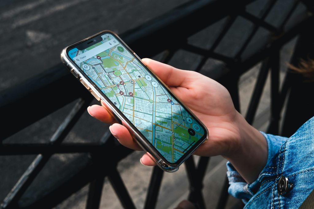 guided path on a phone being held by a woman