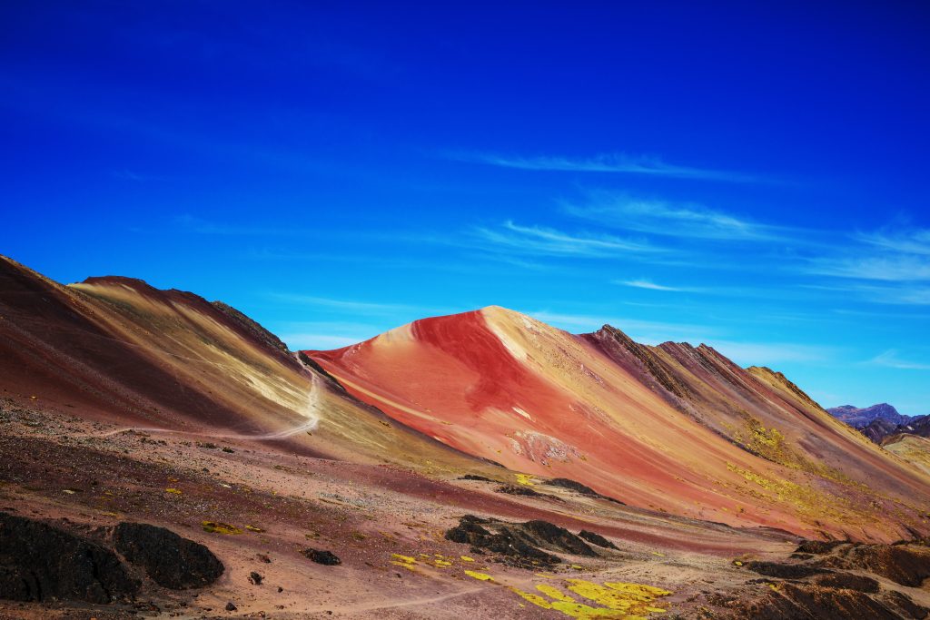 Hiking scene in Vinicunca, Cusco Region, Peru. Montana de Siete Colores, Rainbow Mountain.